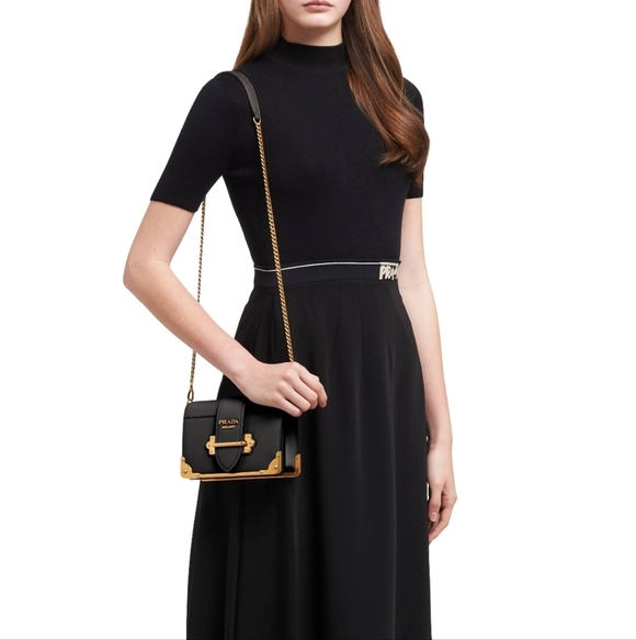 Prada Handbags - BNIB! RARE! Authenticated Prada CAHIER BAG Black and Gold Chain Bag.